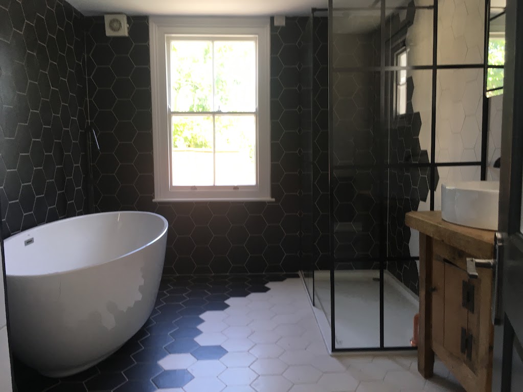 Black and white hexagon tiled bathroom